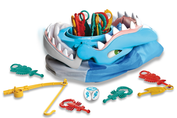 De inhoud van de doos van het kinderspel Happie Haai